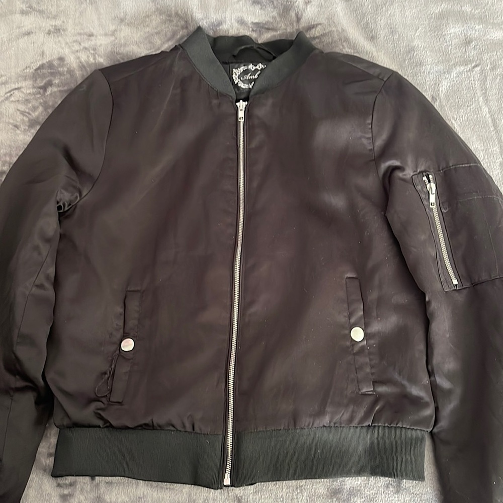 Black comfy jacket. Looks great with almost every outfit adding a nice touch.